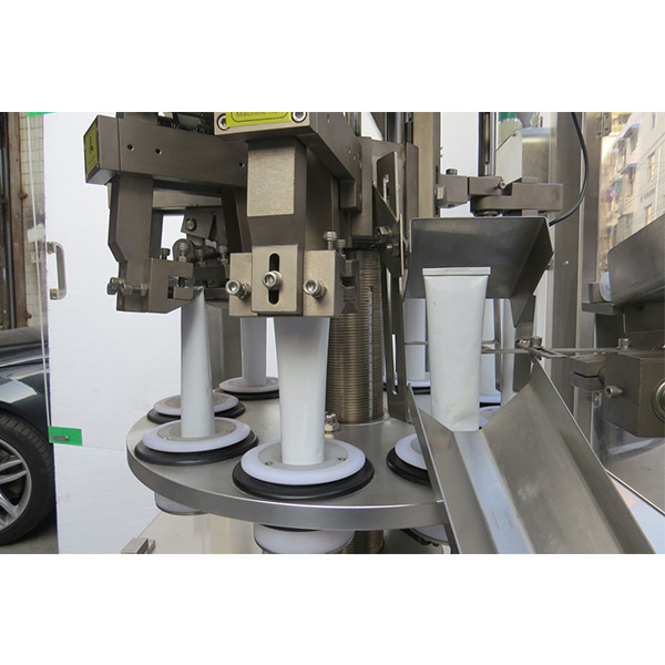 कॉस्मेटिक ट्यूब भरने की मशीन